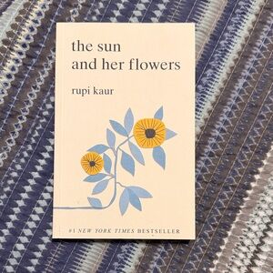 The Sun and Her Flowers Book